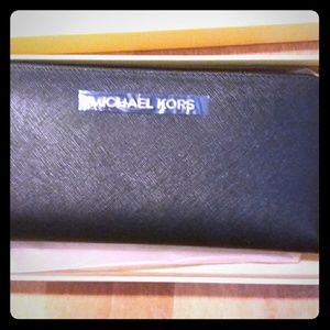 Micheal Kors black zip around wallet